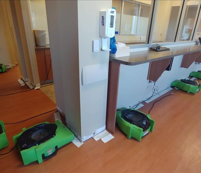 Servpro team ready to help - image of green equipment placed down